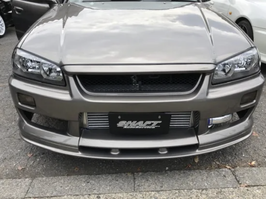 Shaft Auto Service - R34 Grill Top Molding