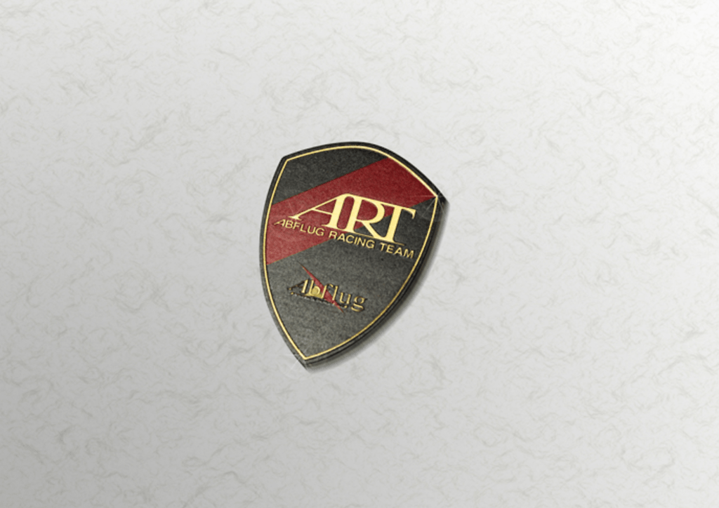 Colour: Red, Black & Gold (Brass) - Size: W50mm H70mm - ART Crest Emblem