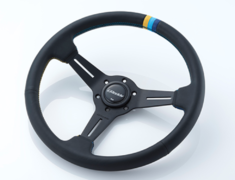 Universal - Standard Edition - Material: Black leather & Black anodized - Color: Black - Diameter: 340mm - Stitch: Yellow/Teal/Navy - 16600001