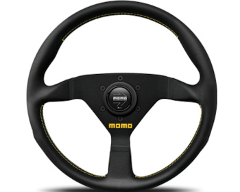 Universal - Material: Leather - Color: Black - Spoke Color: Black - Diameter: 325mm - Stitch: Yellow - V-2