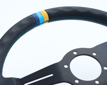 Universal - Standard Edition - Material: Black leather & Black anodized - Color: Black - Diameter: 340mm - Stitch: Yellow/Teal/Navy - 16600001