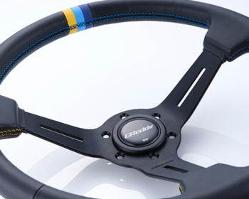 Universal - Standard Edition - Material: Black leather & Black anodized - Color: Black - Stitch: Yellow/Teal/Navy - 16600002