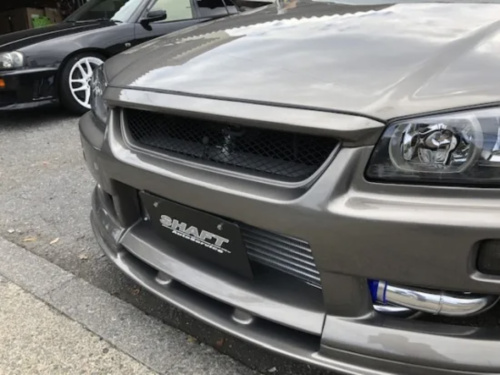 Shaft Auto Service - R34 Grill Top Molding