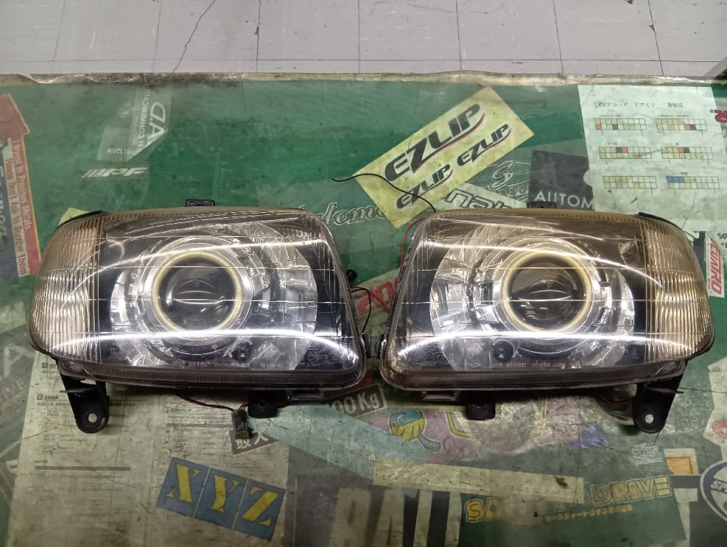 Daihatsu - Junk! Modified genuine L700 Mira headlights (left and