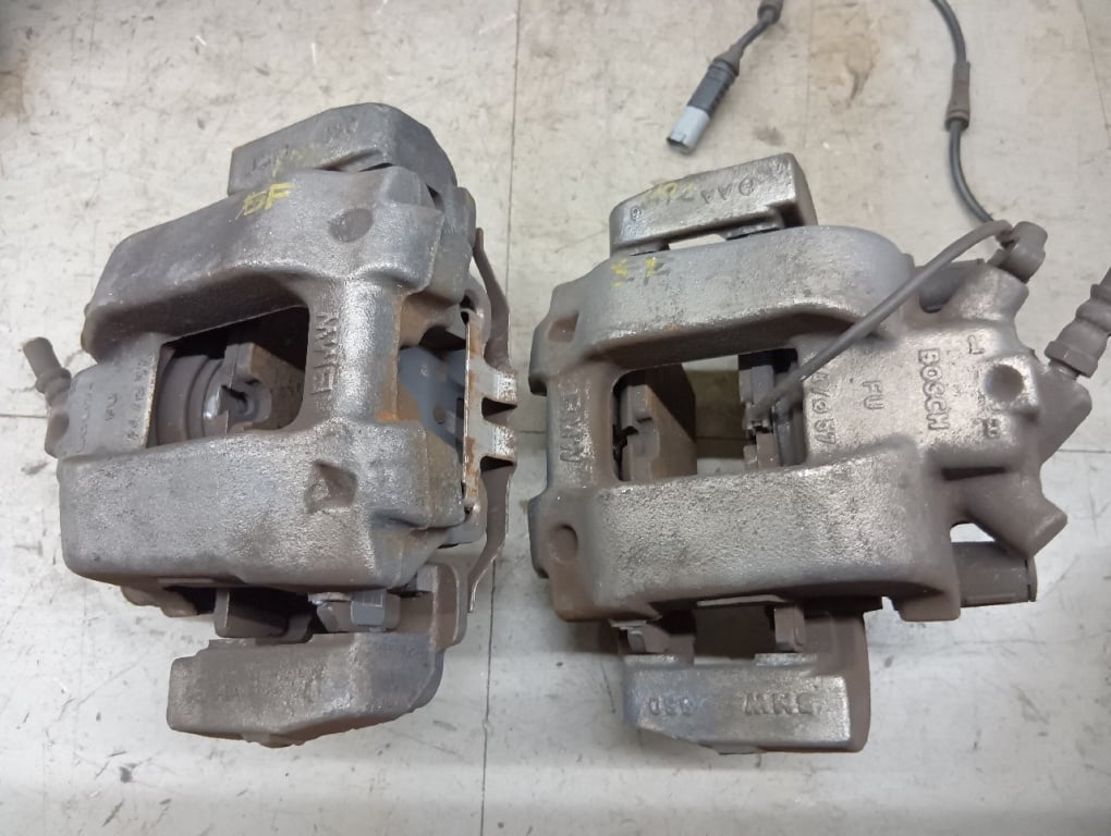 BMW - Used! Genuine F30/320i front brake calipers (left and right)