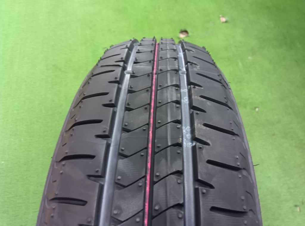 Bridgestone - Set of 4 unused tires (155/65R14)