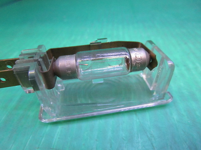 Benz - W124 Benz Early Genuine Curtesi Lamp 1