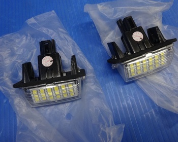Unknown - 2 license lamps for 80 Noah